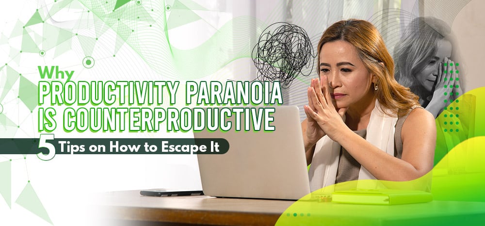 Woman in front of her laptop, appearing worried and paranoid.